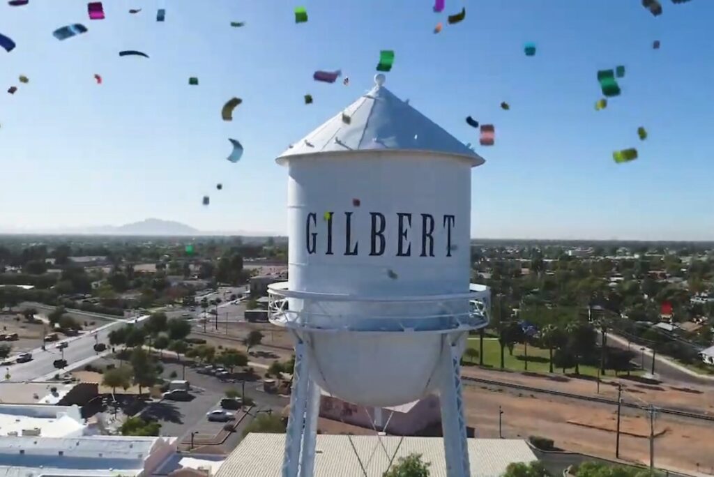 The Gilbert, Arizona water tower with confetti falling around it.
