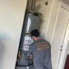 New energy-efficient water heater installed in a home, providing reliable hot water.